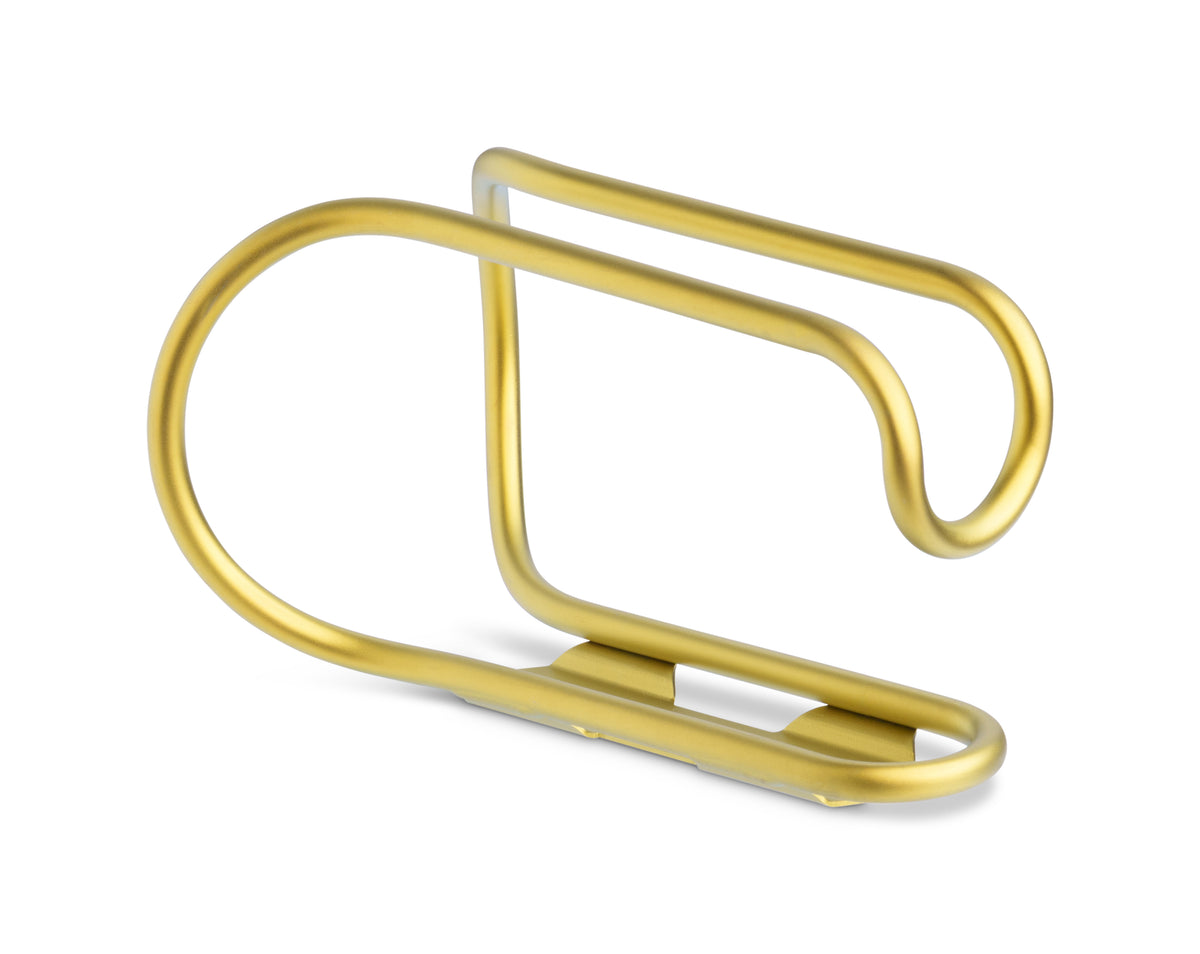 A yellow-finished titanium bicycle bottle cage and a flat mounting base, shown on a clean white background.