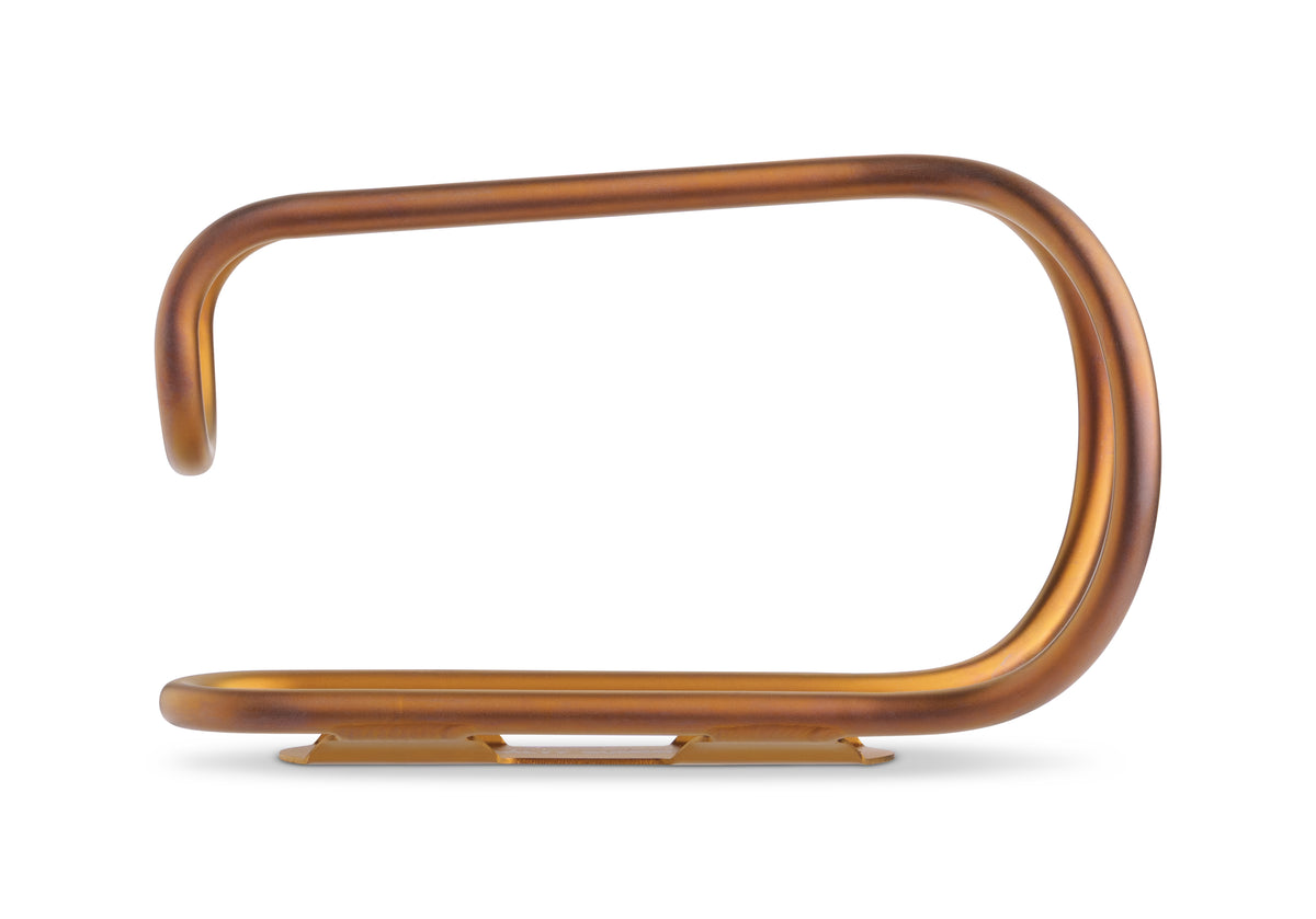 A titanium bottle cage in a warm copper or bronze finish, shown on a solid white background.