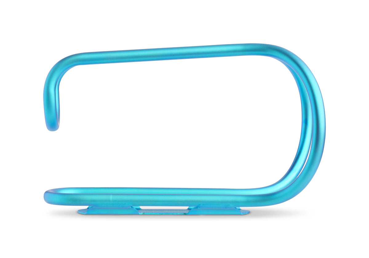 A bright cyan-blue titanium bottle cage, shown on a clean white background with a soft shadow underneath.