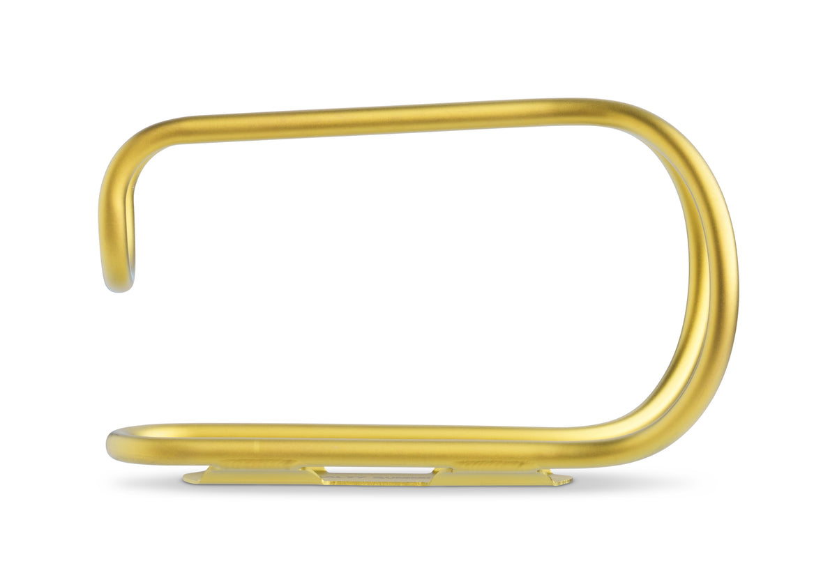A polished yellow titanium bottle cage shown on a clean white background.