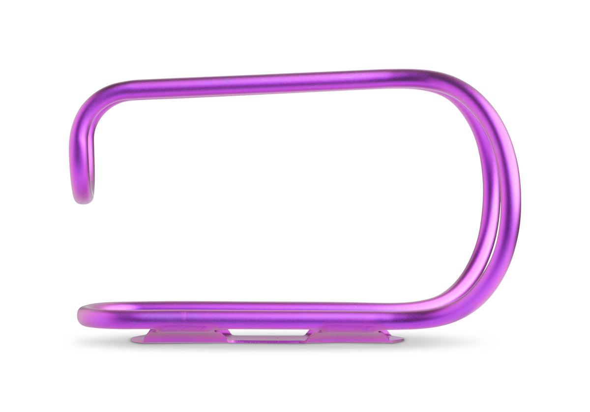 A metallic purple bicycle bottle cage, isolated on a white background with a soft shadow underneath.