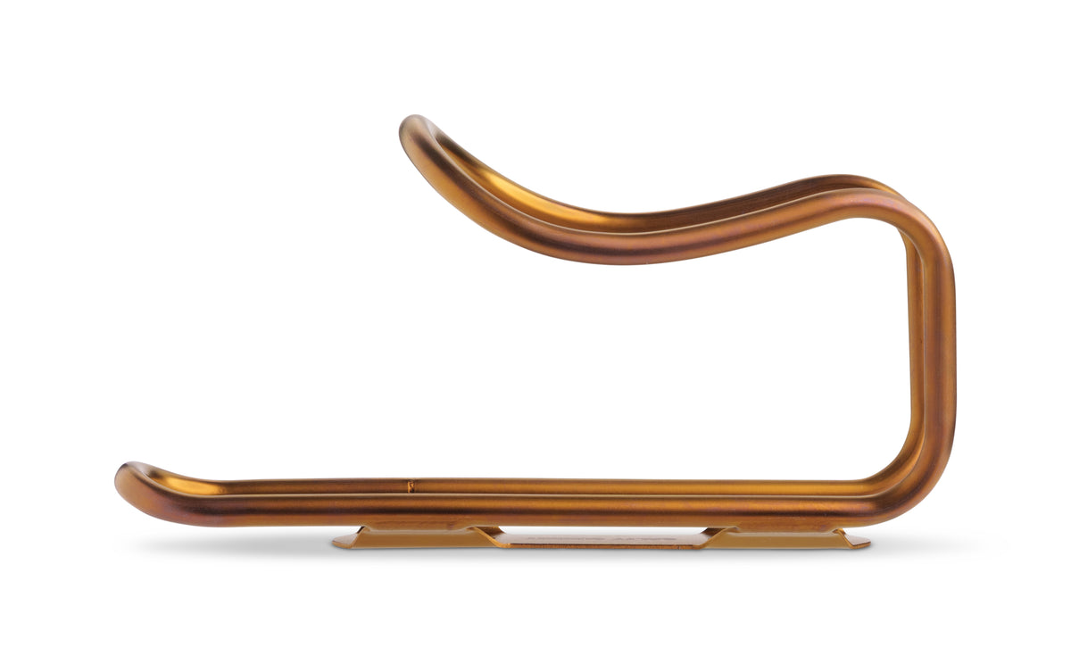 A titanium bicycle bottle cage in a glossy copper or bronze finish, set against a plain white background.